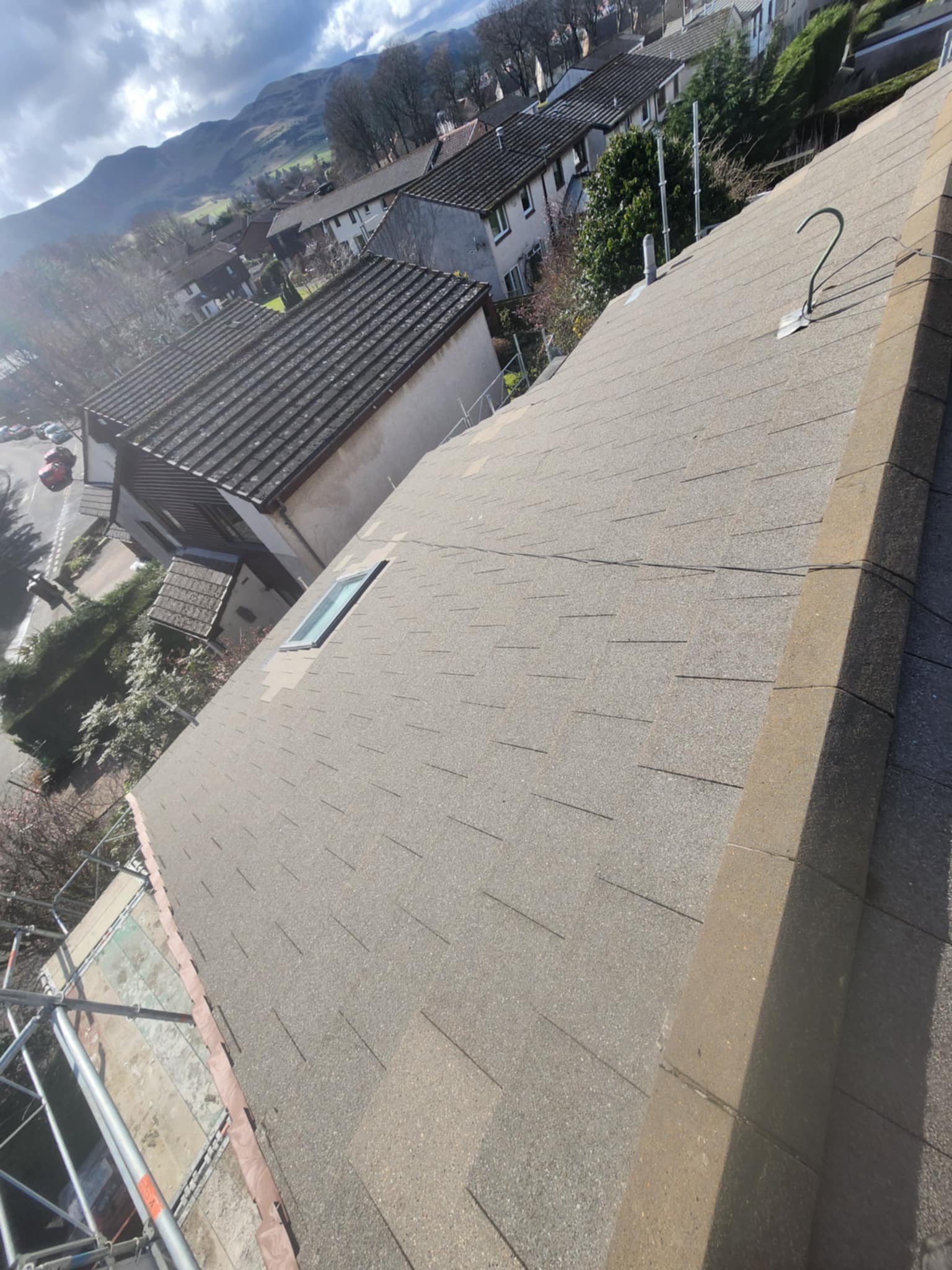 Professional Roof cleaning in harrogate showing the results of moss removal and biocide treatment to remove black spot